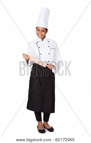 Female Chef With Battledore In Hand