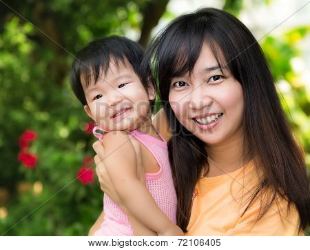 Young Beautiful Asia Mother And Daughter