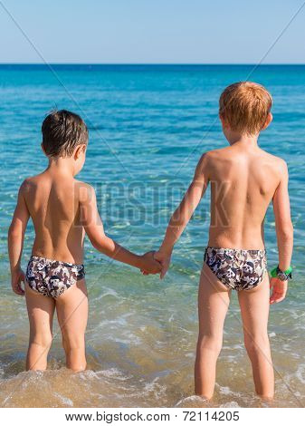 6-7 Years Boys In Front Of Sea Hand In Hand
