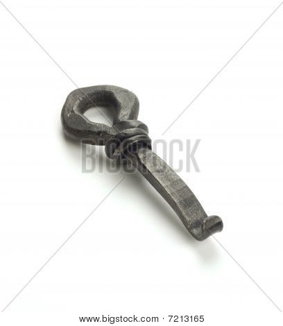 Vintage crown top bottle opener isolated on white