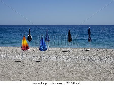 abandoned six beach umbrellas