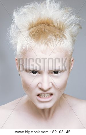 angry aggressive girl in black lenses.