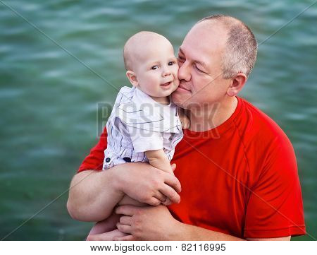 Middle Age Father And His Little Son
