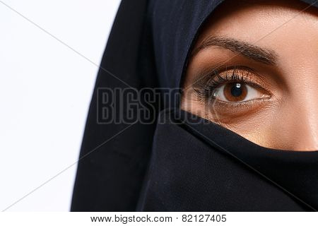 Beautiful Muslim woman looking at camera