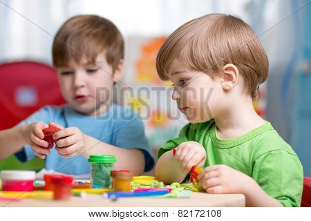 kids with play clay at home