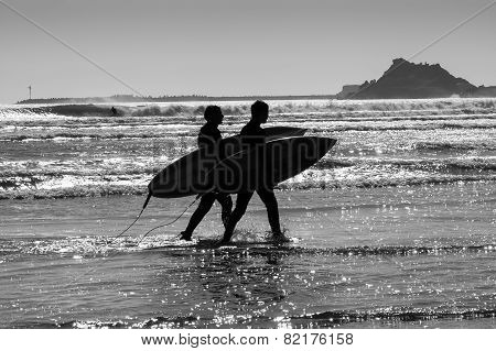 Silhouettes Surfers