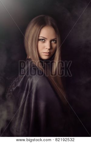 Halloween concept: young and sexy witch