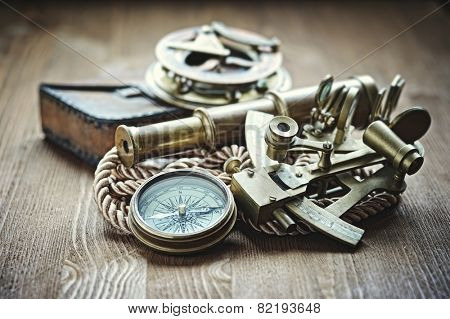 vintage  still life with compass,sextant and spyglass 