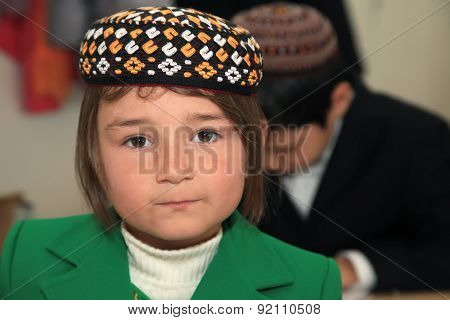 Ashgabad, Turkmenistan - November 4, 2014. Portrait Of An Unknown Schoolgirl In The Classroom.  Nove