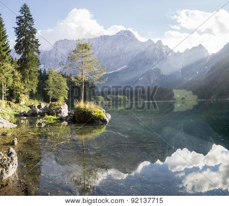 Alpine lake,Sunrise over the alpine lake Laghi di Fusine