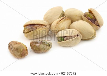 Pistachio nuts on a white background