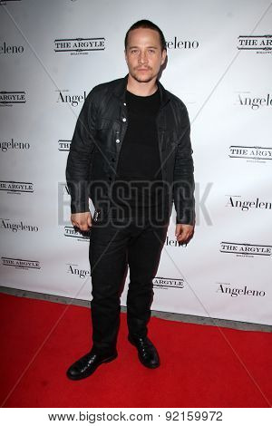 LOS ANGELES - MAY 31:  Travis Aaron Wade at the Angeleno Magazine  June 2015 Issue Party with Cover Man Adrian Grenier at the The Argyle on May 31, 2015 in Los Angeles, CA