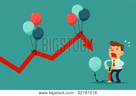 Businessman Pumping Balloon To Help Falling Graph