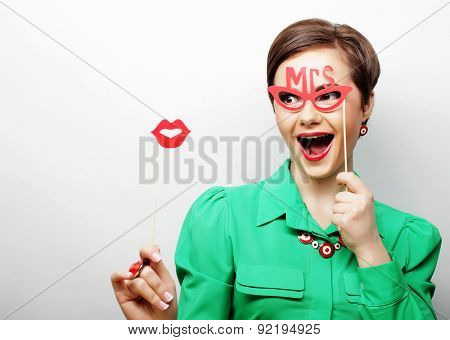 Attractive playful young woman ready for party - falce lips and glasses   