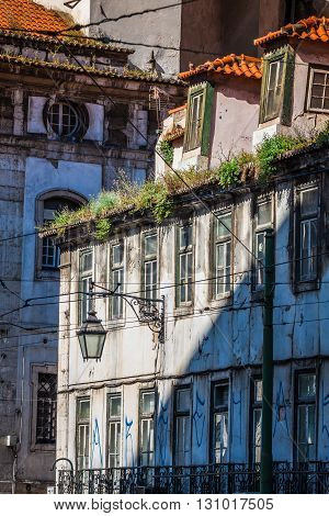 Facade of old house in Alfama district Lisbon