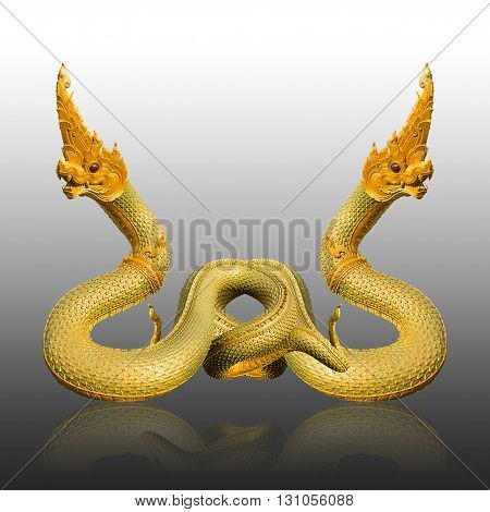 Naga Thai statue on gray background with shadow