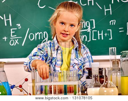 Child toch flask in chemistry class. 