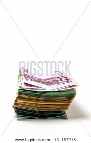 Different Euro Bills Are Spread Out On A Table In The Form Of A Stack Of Money.