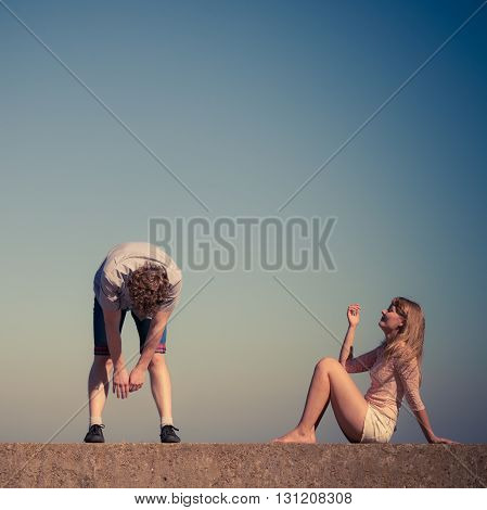 Happiness summer dating concept. Man and woman spending time together having fun outdoor.
