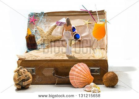 Full open suitcase travel concept  isolated on white selective focus