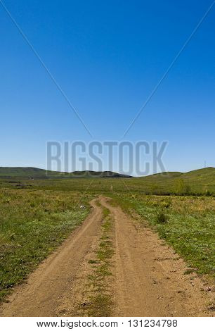 Beautiful country road receding into the distance