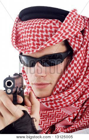 Man Holds Gun While Wearing A Keffiyeh