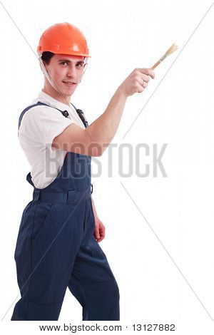 Muscolare uomo giovane in un generatore uniforme con strumenti.