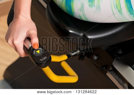 Close-up Of Woman Hand Holding An Ascending Level Handle