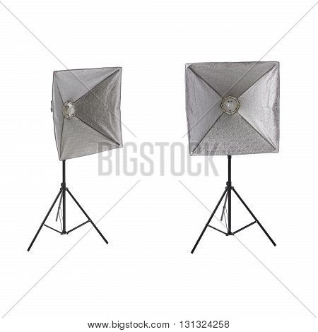 Set ofa studio flash with square softbox on a stand over isolated white background