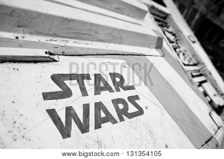 Podol, Ukraine - May 19, 2016: Star Wars Logo On Flying Space Machine. Black And White Photo