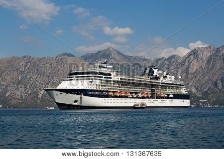 KOTOR MONTENEGRO - SEPTEMBER 23 2015 : Large cruise ship Celebrity Constellation in Boka Kotorsky Bay. Kotor has one of the best preserved medieval old towns in the Adriatic