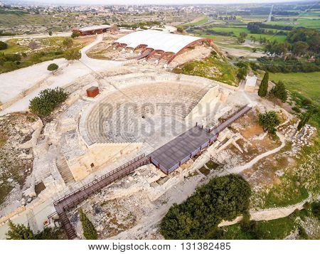 Aerial view of the arcaeological site of the ancient city of Kourio which is located in the district of Limassol Cyprus. A view from the top of the greek roman theatre forming a semicircle the beach and fields.