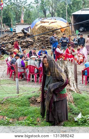 KathmanduNepal - May 212016 : A poor Nepali Man is around the party venue with hoping to get something to eat.