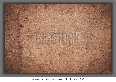Brown crumpled paper with texture and pattern Brown paper with pattern on gray background Texture of brown paper with pattern for design