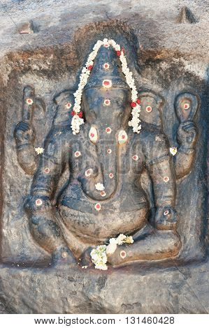 Indian God Ganesha stone bass-relief in Hampi