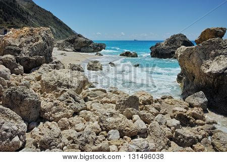 Big Rock in the blue waters of Megali Petra Beach, Lefkada, Ionian Islands, Greece
