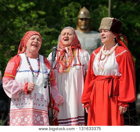 Orel Russia - May 9 2016: Celebration of 71th anniversary of the Victory Day (WWII). Old woman choir closeup