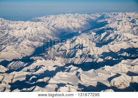Snow mountains range near Himalaya in Ladakh, India (view from airplane)