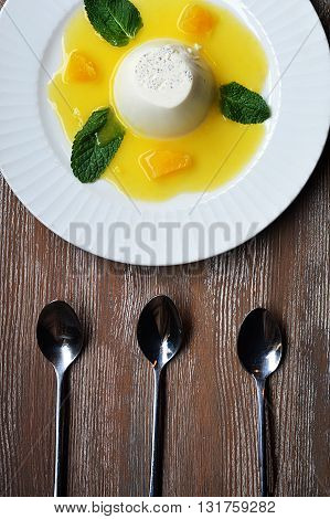 Italy Dessert - Delicious panna cotta with passion fruit sauce