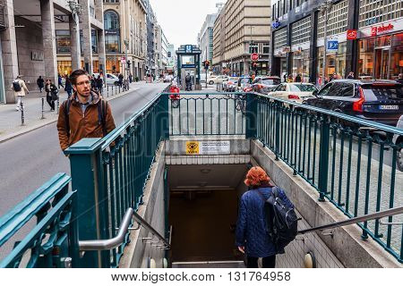 Berlin Germany - May 17 2016: street view of Friedrichstrasse with unidentified people. The Friedrichstraße is a major culture and shopping street in central Berlin.
