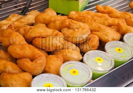 Crispy Crullers with jam on the grate.