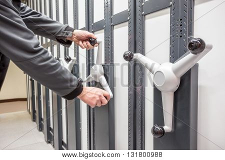 several movable shelves in the basement of the building
