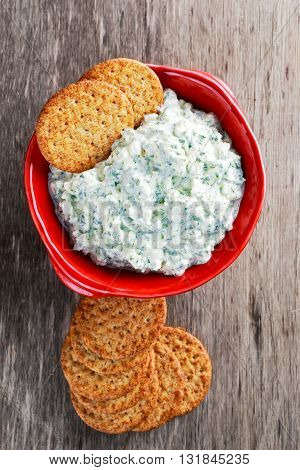 Bisquit cracker appetizers with cottage chees topping,