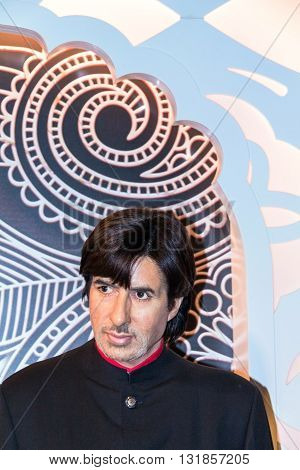 LONDON UK - JUNE 7 2015: Amitabh Bachchan Bollywood actor in Madame Tussaud wax museum. It is one of major tourist attraction.