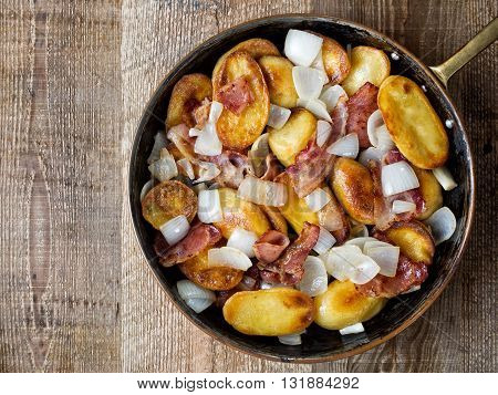 close up of rustic german home fries bratkartoffeln