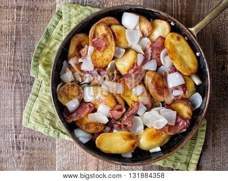 close up of rustic german home fries bratkartoffeln
