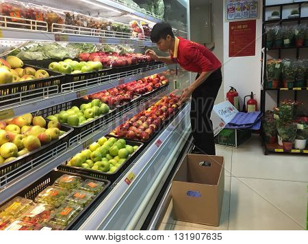Hanoi, Vietnam - May 29, 2016: Many kind of fruits and vegetables being displayed for sale at a Vinmart supermarket. Vinmart is and retailer brand of Vingroup - a biggest Vietnamese corporation.