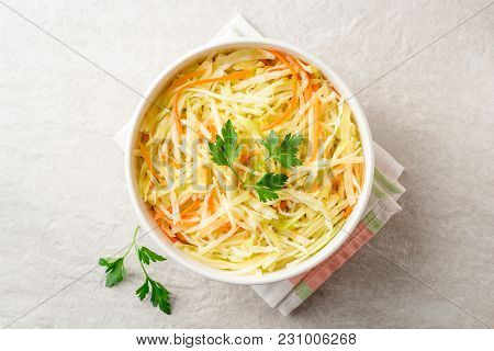 Fresh Coleslaw Salad In Bowl On Gray Stone Background.