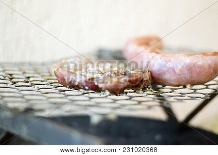 Brazilian Meat Grilling At A Churrasco On A Churrasqueira