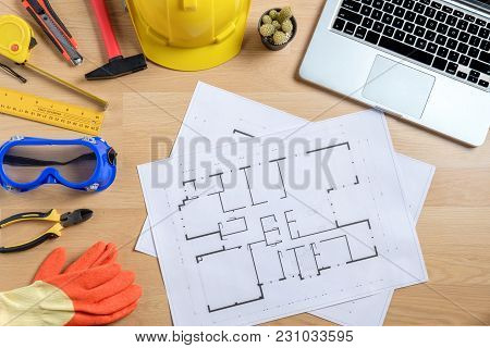 Office Desk With Computer, Cup Of Coffee And Engineer Equipment.top View With Copy Space. Background